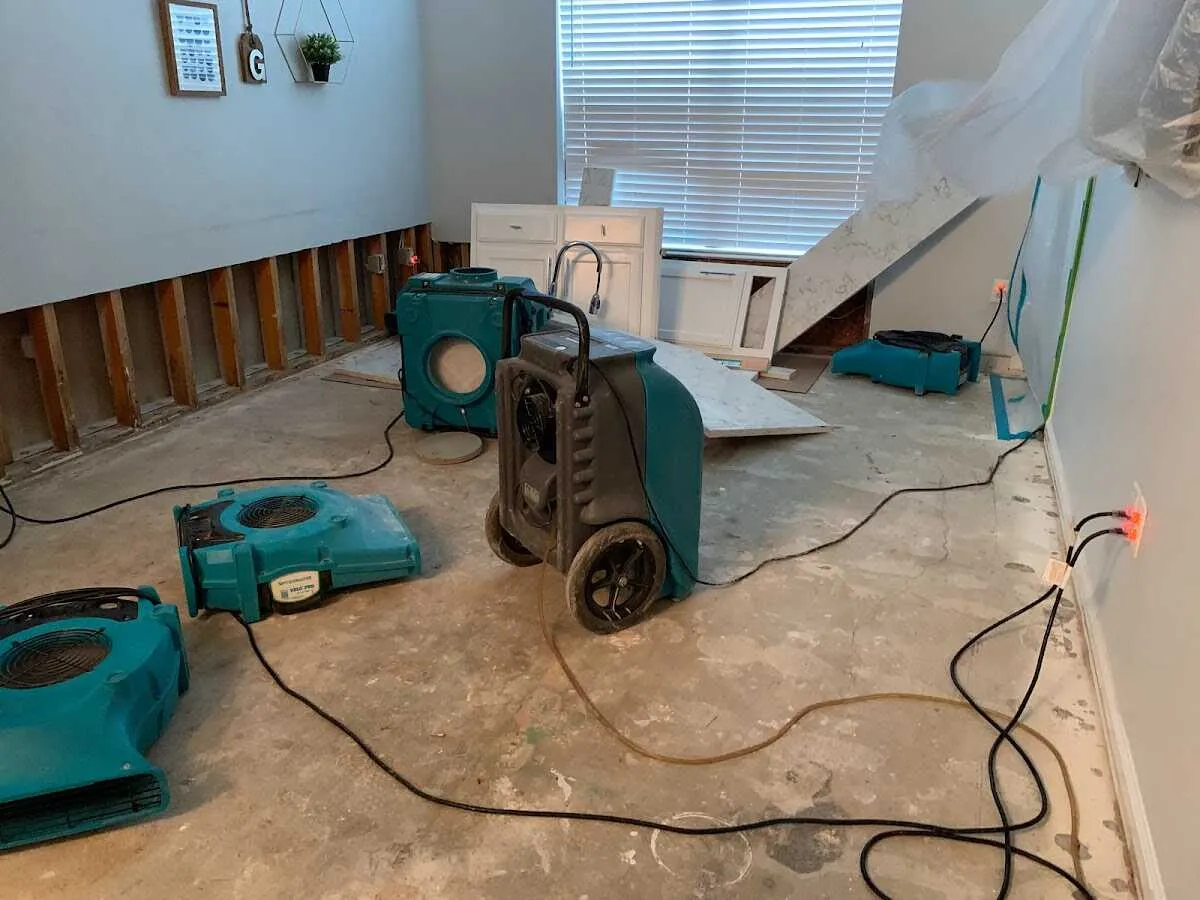 Dehumidifier in flood-cut room for Water Damage Restoration in Valley Center